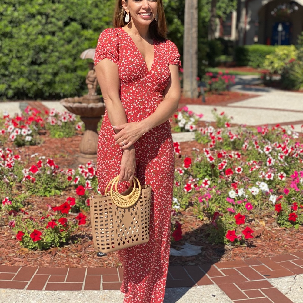 Francesca’s red floral jumpsuit